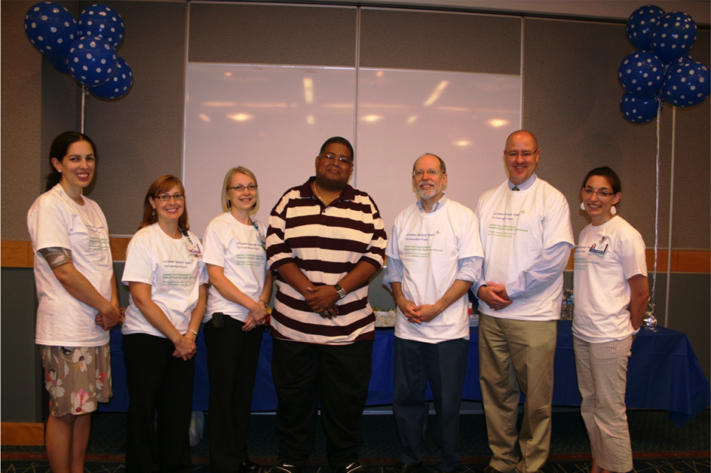 Lancaster General Health Superutilizer Project. From left to right: Katie Schultz (attorney), Wendy Walton (Social Worker), Amber Jerauld (Pharmacist), "Mr. Williams" (Client), Adam Wilikofsky (Clinical Psychologist), Jeffrey Martin (physician), Audrey Martin (LCSW)