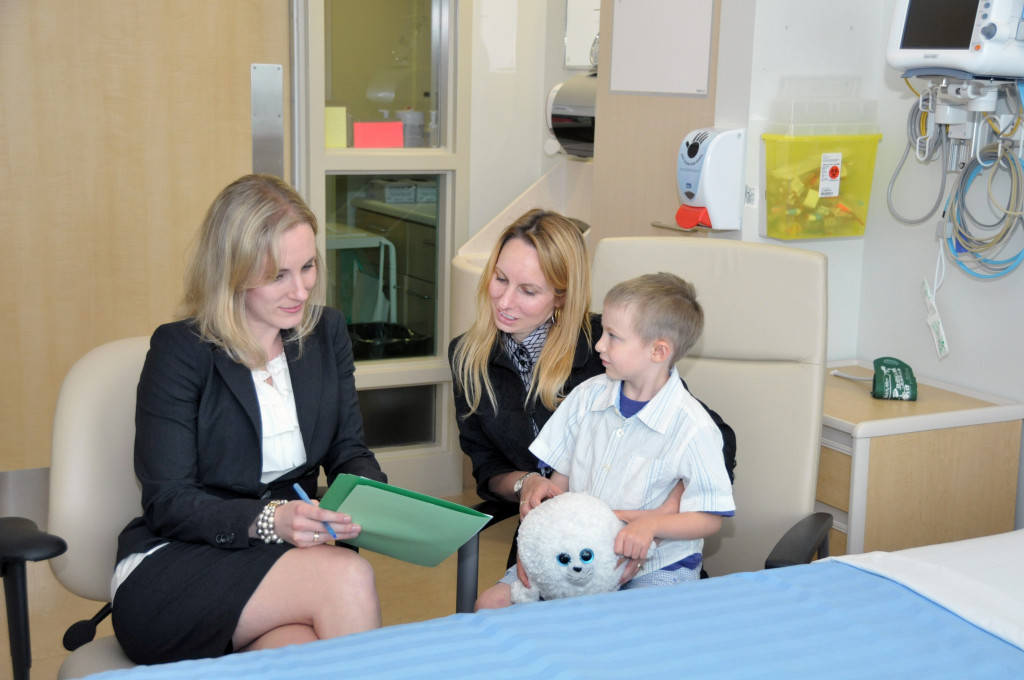 Stephanie Dickson, Special Counsel to Pro Bono Law Ontario's Medical Legal Partnerships, meets with a patient-family.