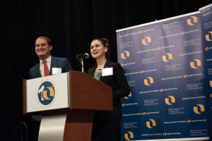 Emily Bourdeau and Braden Lang from The Advisory Board Company accepting the MLP Leadership Award. (Photo credit: Z Miller Photography.)